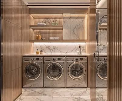 Completed laundry with marble benchtop and timber joinery