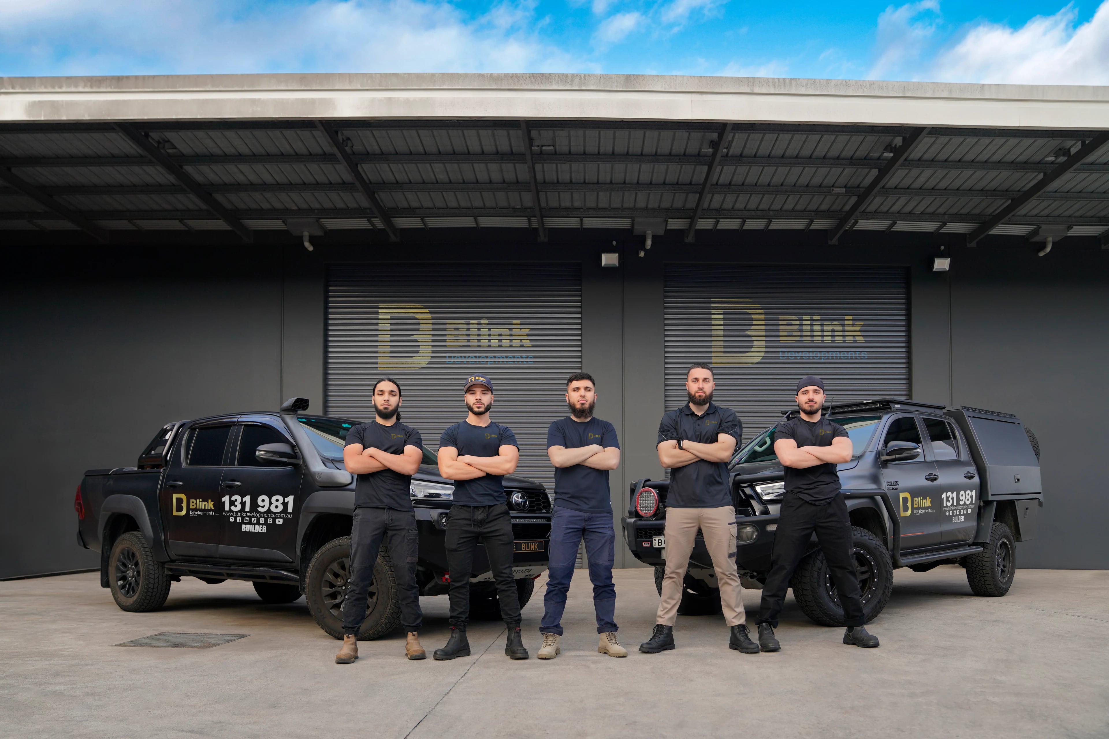 The Bathroom Renovation Villawood team with their work vehicles